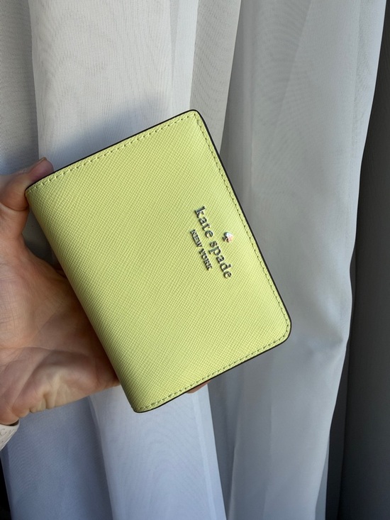 kate spade Handbags - kate spade Lemon Yellow Saffiano Leather Bifold Wallet
